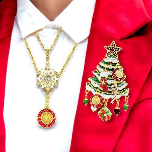 Ritzy Couture DeLuxe Christmas tree pin with hand-enameling and crystals on a red jacket lapel, showcasing festive holiday design