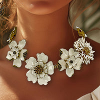 Carolina Herrera Gold Plate White Enamel Multi-Flower Black Crystal Bib Necklace