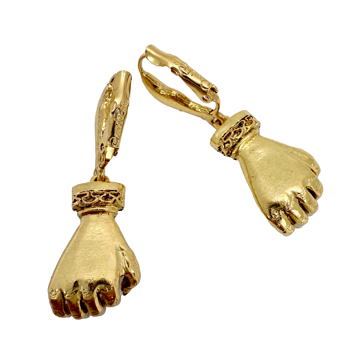 Back view of the Oscar de la Renta glove earrings and logo, highlighting their unique craftsmanship