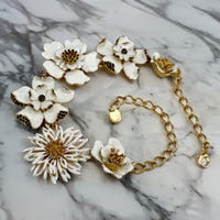 Carolina Herrera Gold Plate White Enamel Multi-Flower Black Crystal Bib Necklace