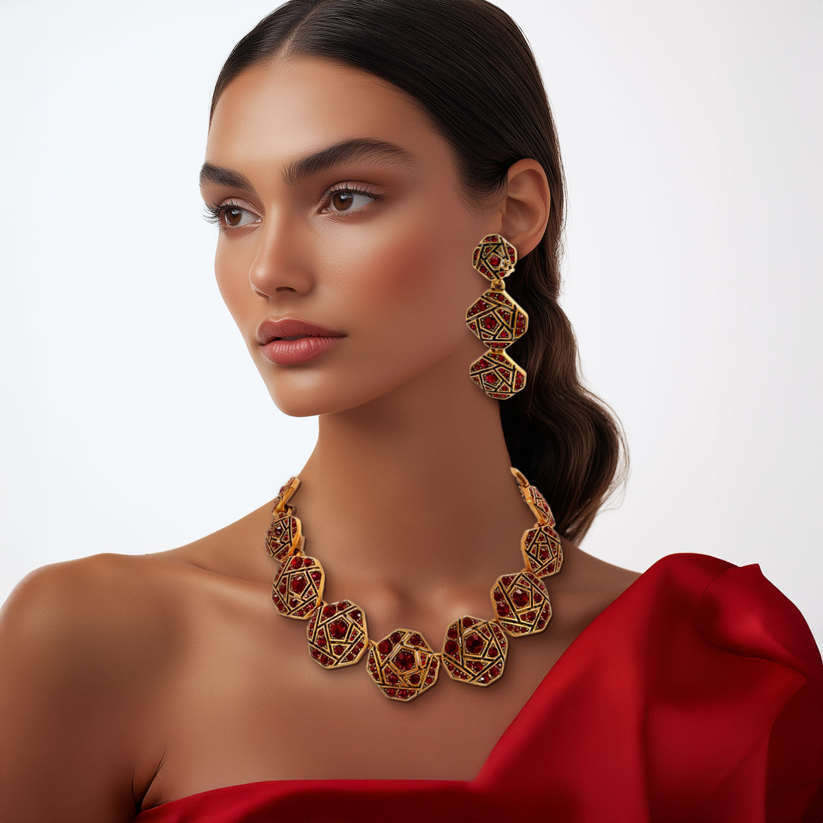 Model wearing the earrings, emphasizing their bold statement style and radiant red crystal accents.