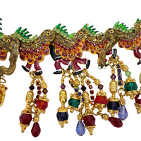 Front view of Lunch at The Ritz Year of the Dragon Parade Brooch, featuring gold-tone enamel, vibrant crystals, and articulated sections.