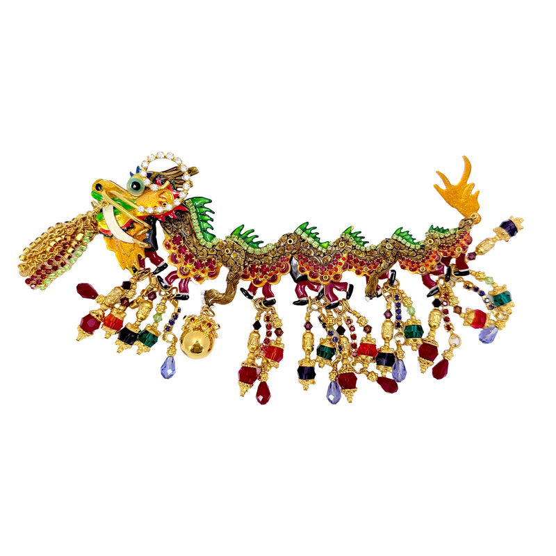 Front view of Lunch at The Ritz Year of the Dragon Parade Brooch, featuring gold-tone enamel, vibrant crystals, and articulated sections