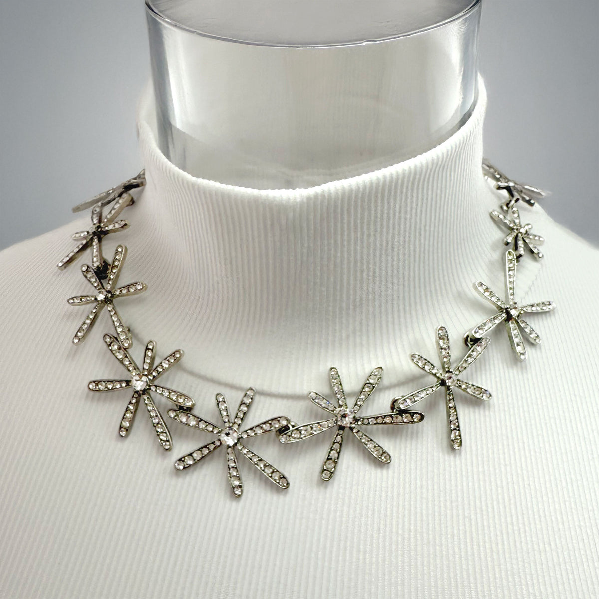 Oscar de la Renta Crystal Pavé Star Flower Necklace with Rhodium PlatingOscar de la Renta Crystal Pavé Star Flower Necklace - Radiant Elegance