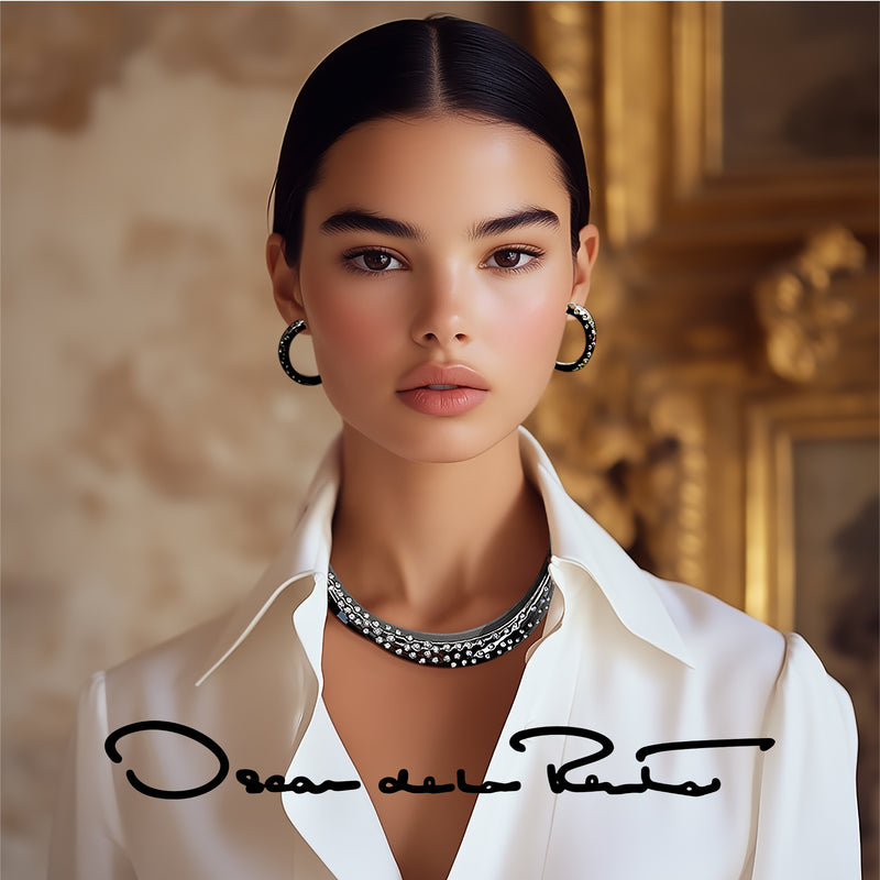 Oscar de la Renta Silver Necklace and Hoop Earrings – Luxury Designer Jewelry
A polished image of a model wearing Oscar de la Renta jewelry, including a shimmering silver-tone layered necklace and matching hoop earrings. Ideal for elegant outfits and high-end occasions.